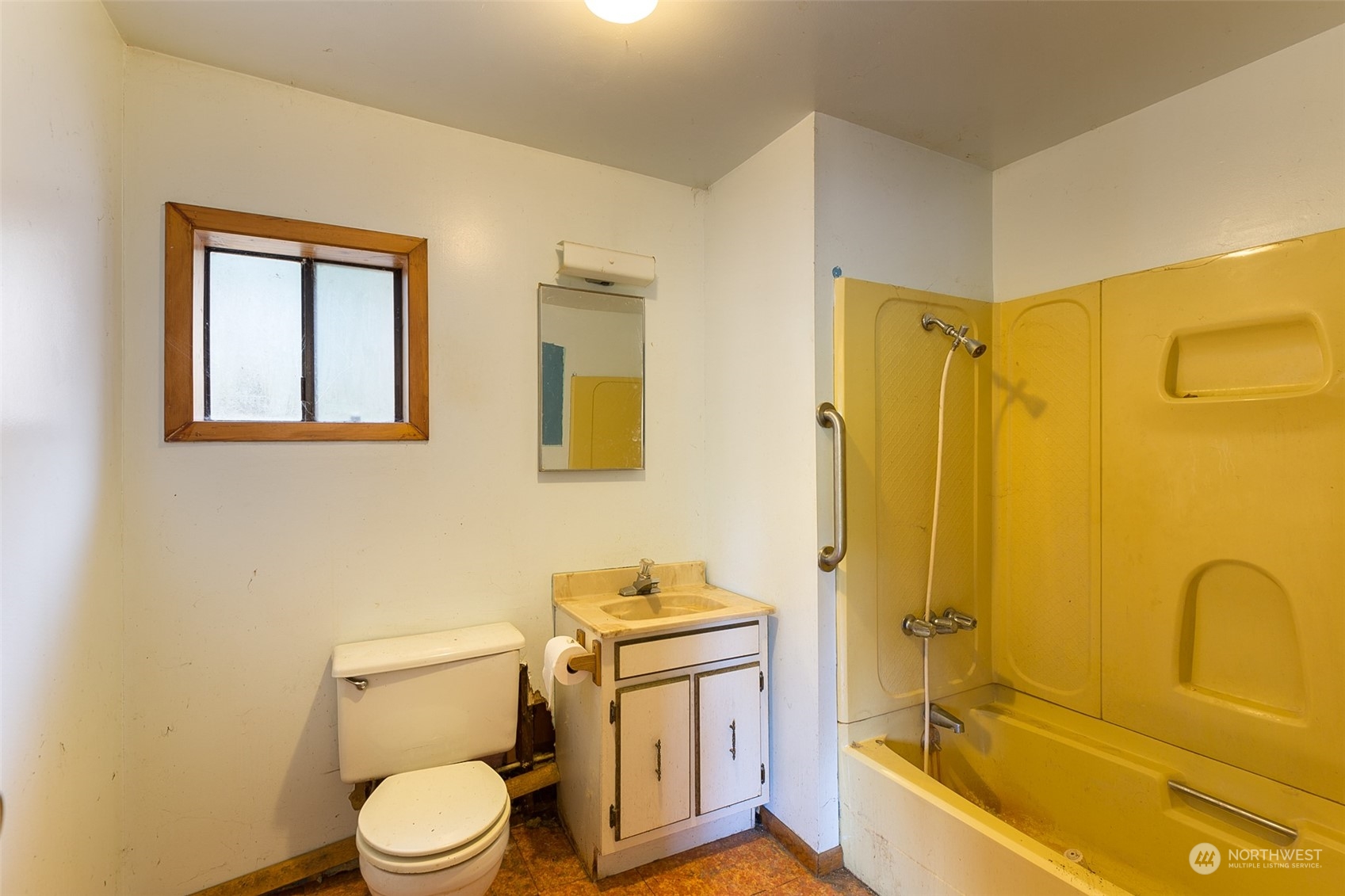 197 Jay Robinson Road Sequim, WA 98382 - Photo 11 of 40 a bathroom with a granite countertop toilet sink and mirror
