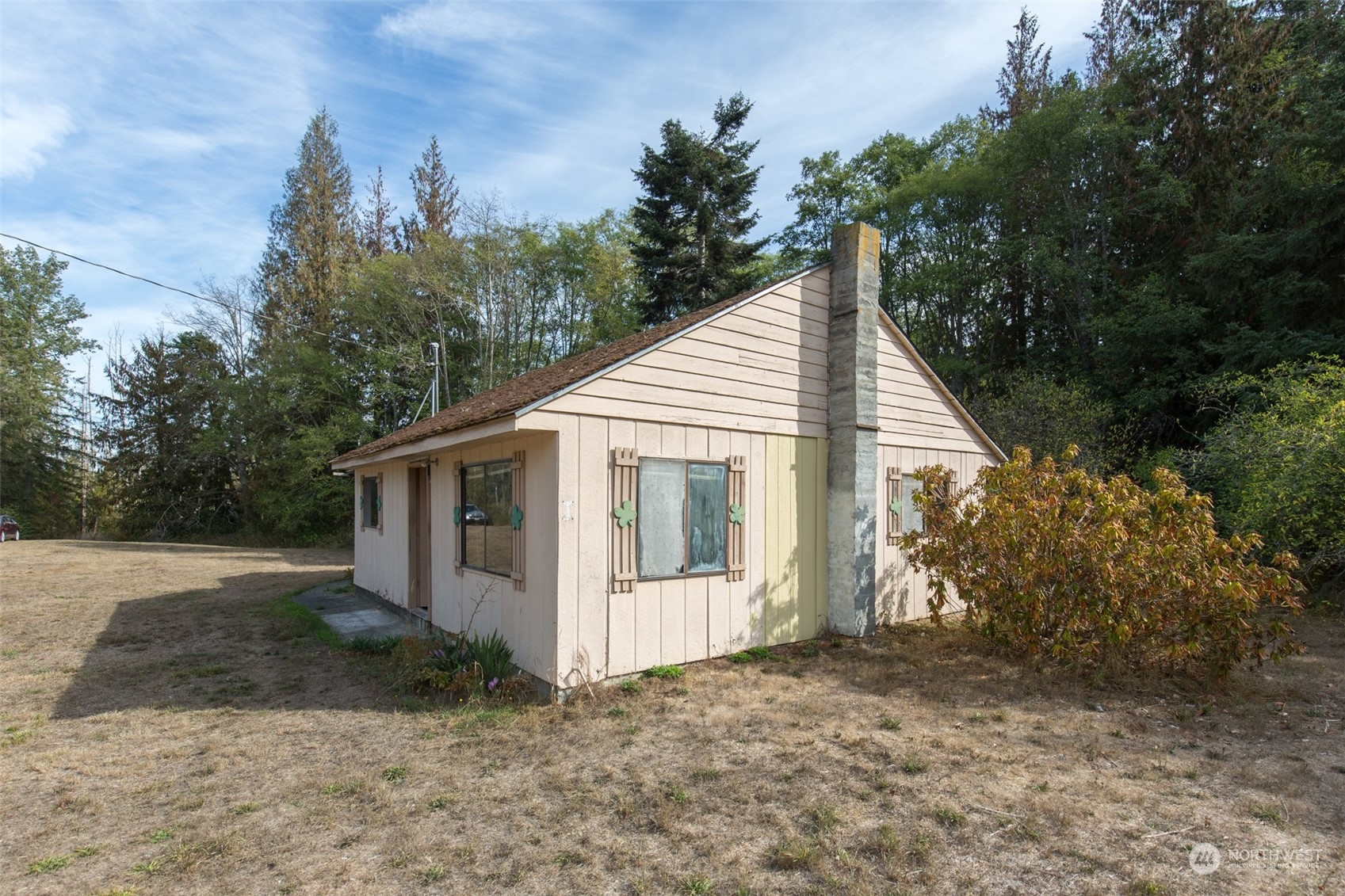 197 Jay Robinson Road Sequim, WA 98382 - Photo 20 of 40 a view of a house with a yard