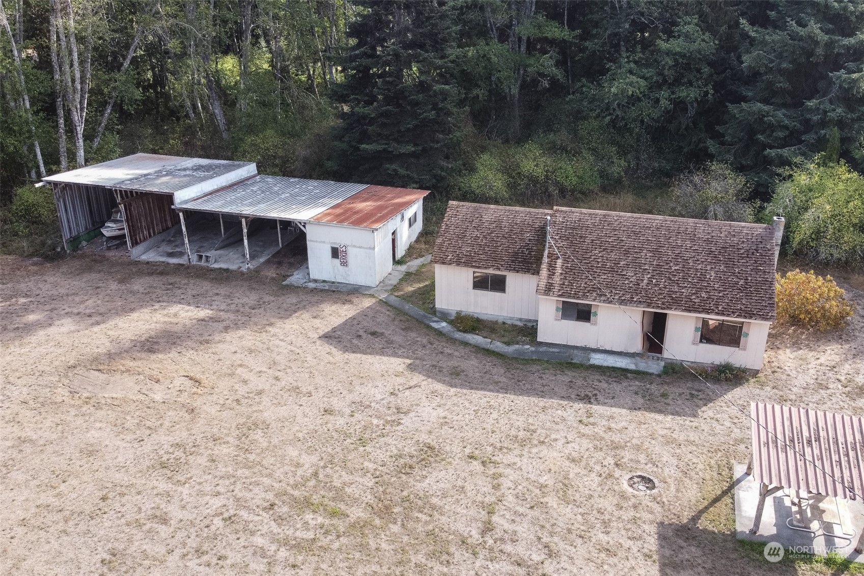 197 Jay Robinson Road Sequim, WA 98382 - Photo 24 of 40 an aerial view of a house with yard and patio