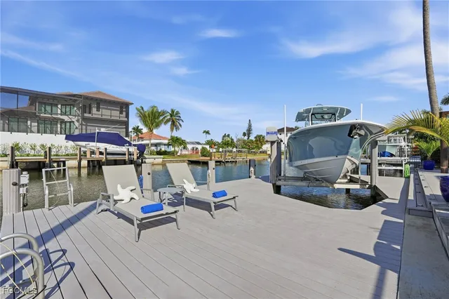 a view of a chairs and table on the terrace