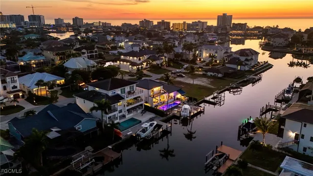 an aerial view of a houses with outdoor space