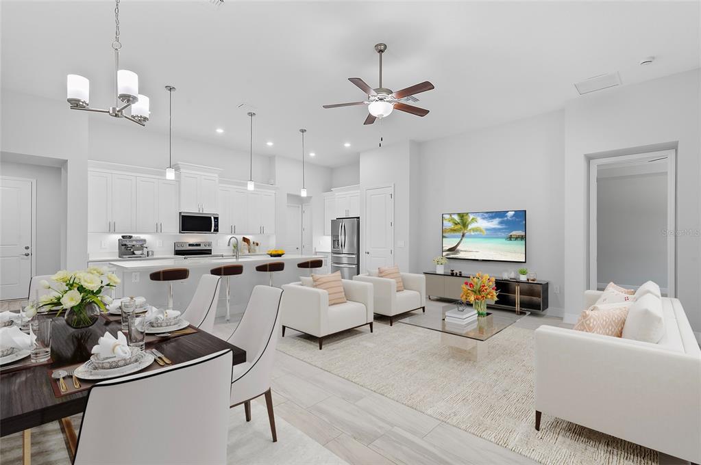 304 North Jungle Road Geneva, FL 32732 - Photo 2 of 49 a living room with furniture kitchen view and a chandelier