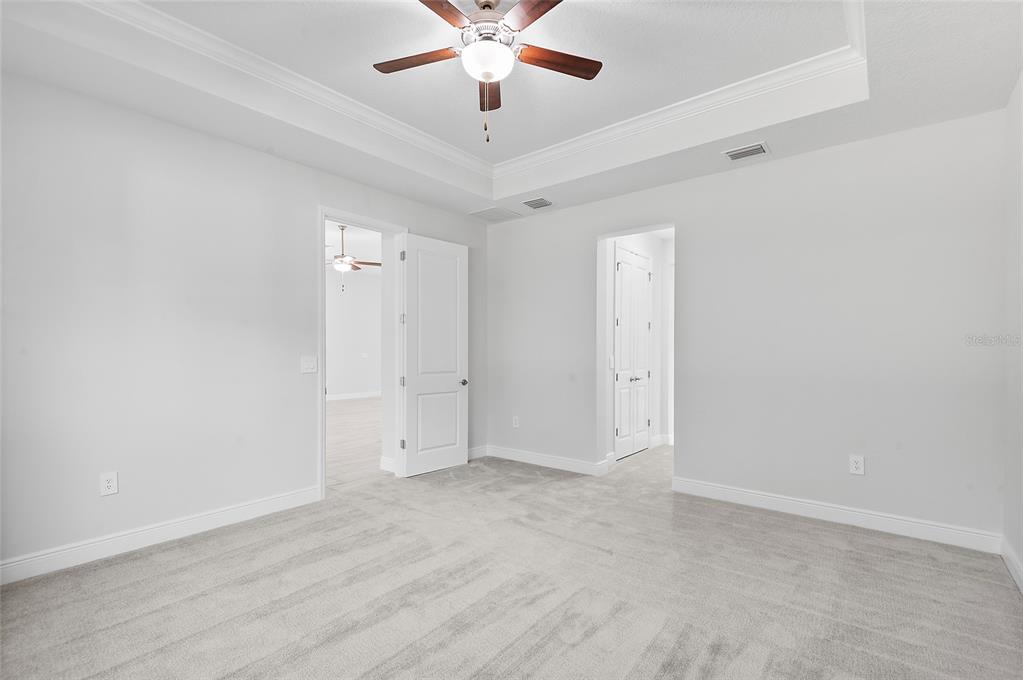 304 North Jungle Road Geneva, FL 32732 - Photo 23 of 49 an empty room with fan and a ceiling fan