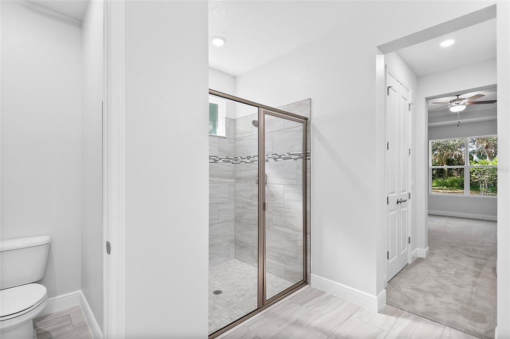 304 North Jungle Road Geneva, FL 32732 - Photo 28 of 49 a bathroom with a shower and toilet