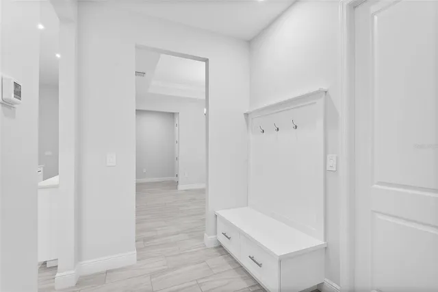 a bathroom with a tub and shower