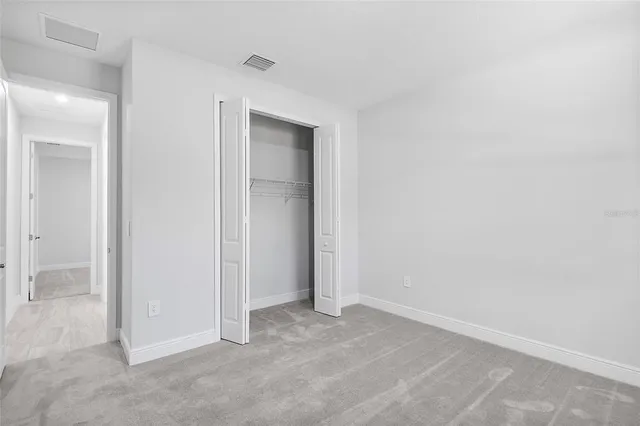 an empty room with closet