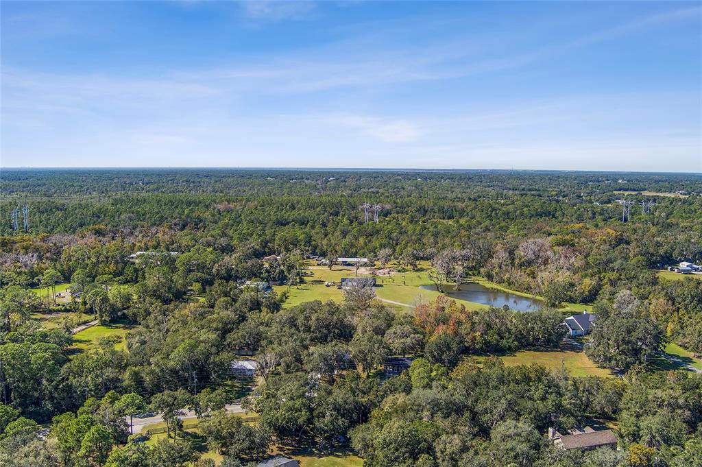 304 North Jungle Road Geneva, FL 32732 - Photo 46 of 49 an aerial view of residential houses and outdoor space