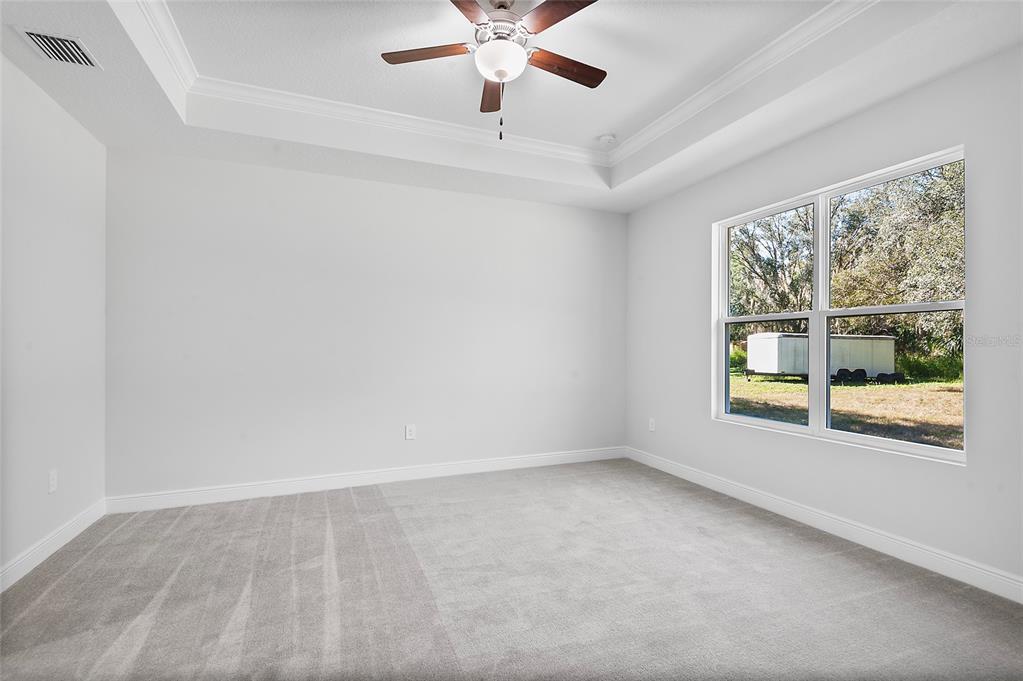 304 North Jungle Road Geneva, FL 32732 - Photo 7 of 49 a view of an empty room with a window