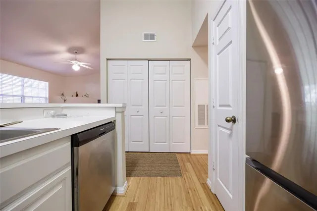 a view of a kitchen from the hallway