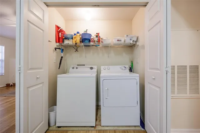 a utility room with dryer and washer
