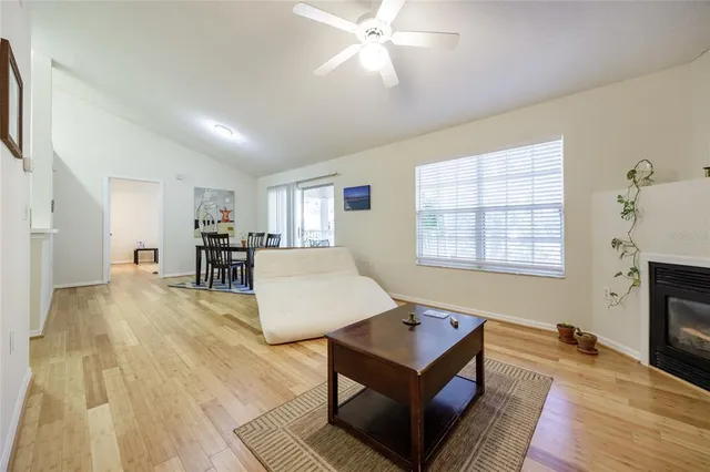 a living room with furniture and a table