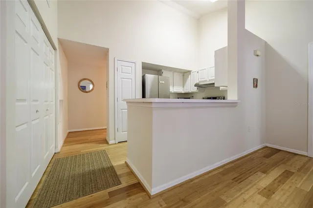 a view of a kitchen from the hallway