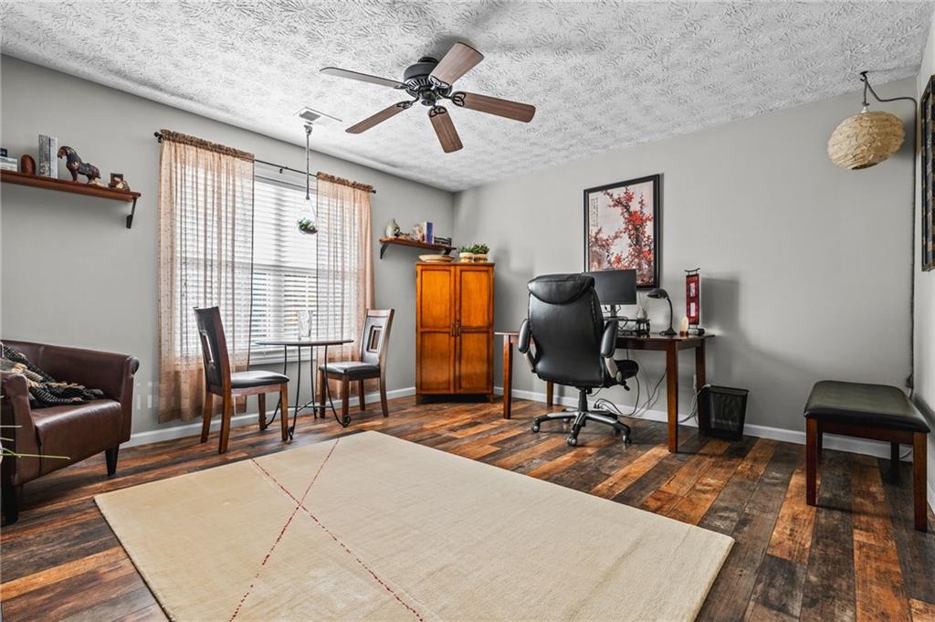202 Weatherstone Crossing Woodstock, GA 30188 - Photo 19 of 29 a workspace with furniture and a window