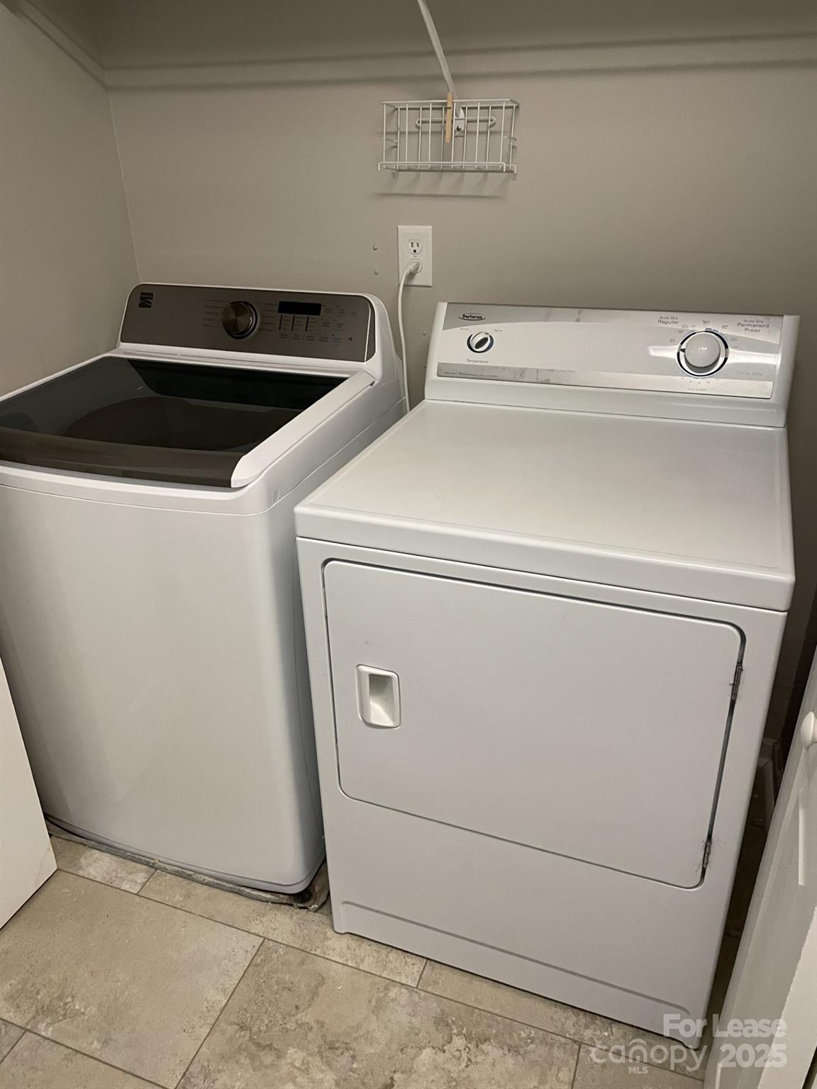 19831 Henderson Road, Unit E Cornelius, NC 28031 - Photo 14 of 23 a utility room with dryer and washer