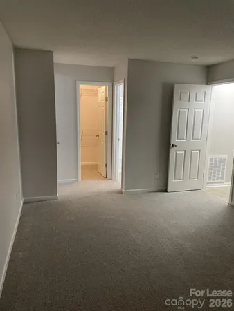 a bathroom with a shower and a toilet