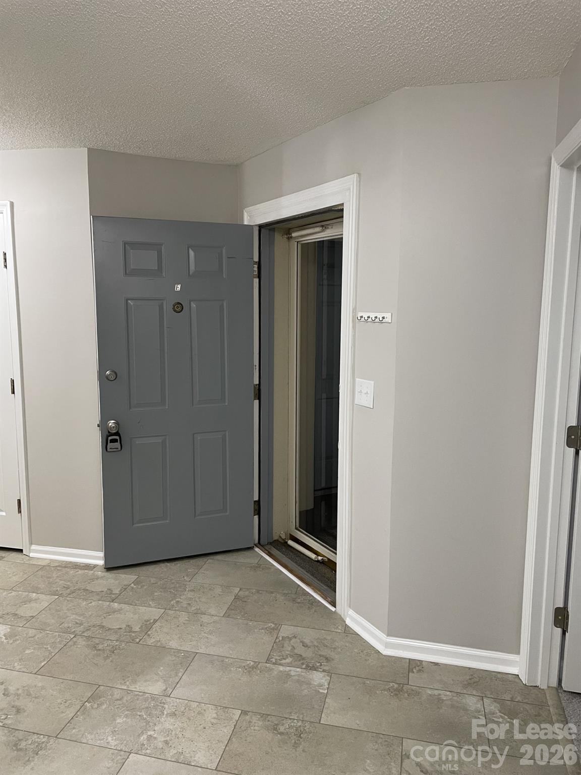19831 Henderson Road, Unit E Cornelius, NC 28031 - Photo 5 of 27 a view of an empty room