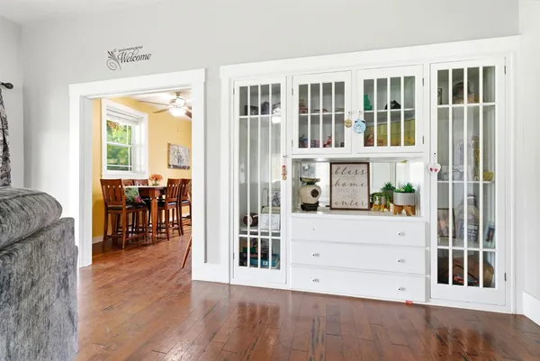 a view of a living room and entry way