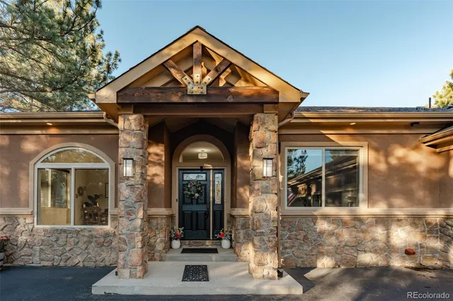 a workspace with furniture window and wooden floor