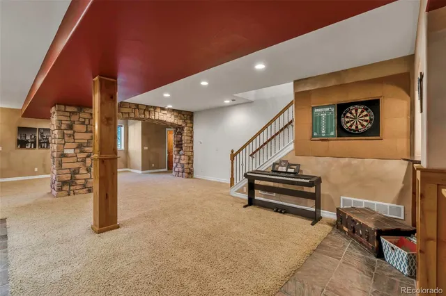 a view of a hall with stairs