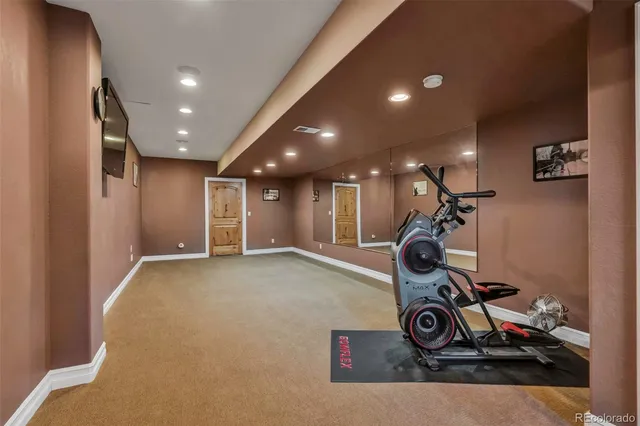 a view of a room with gym equipment