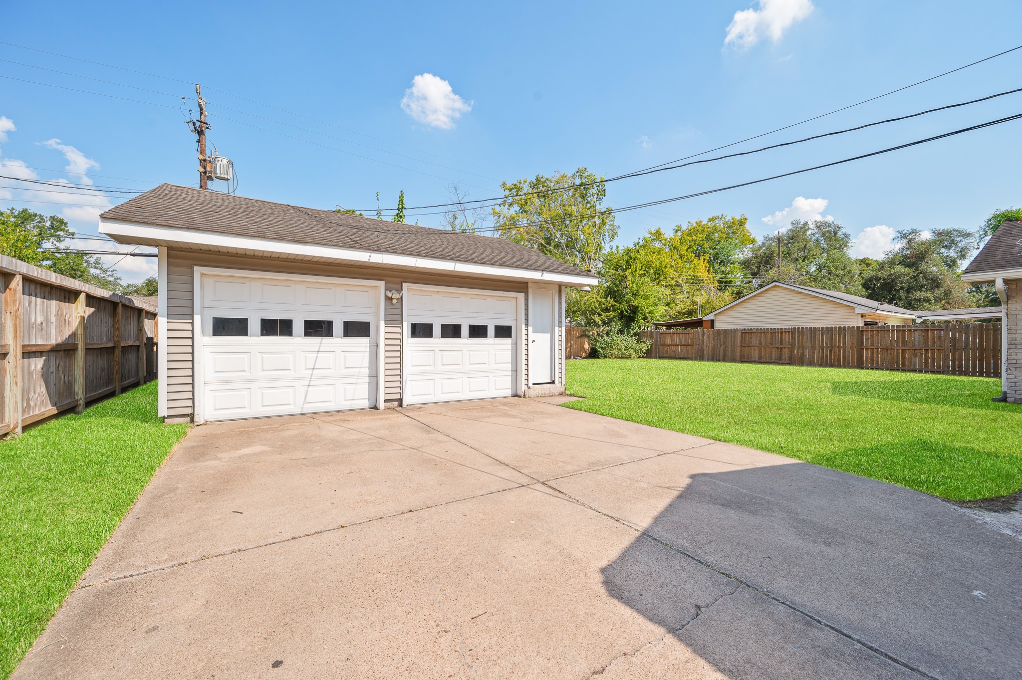 8314 Edgemoor Drive Houston, TX 77036 - Photo 32 of 34 a view of a house with a yard