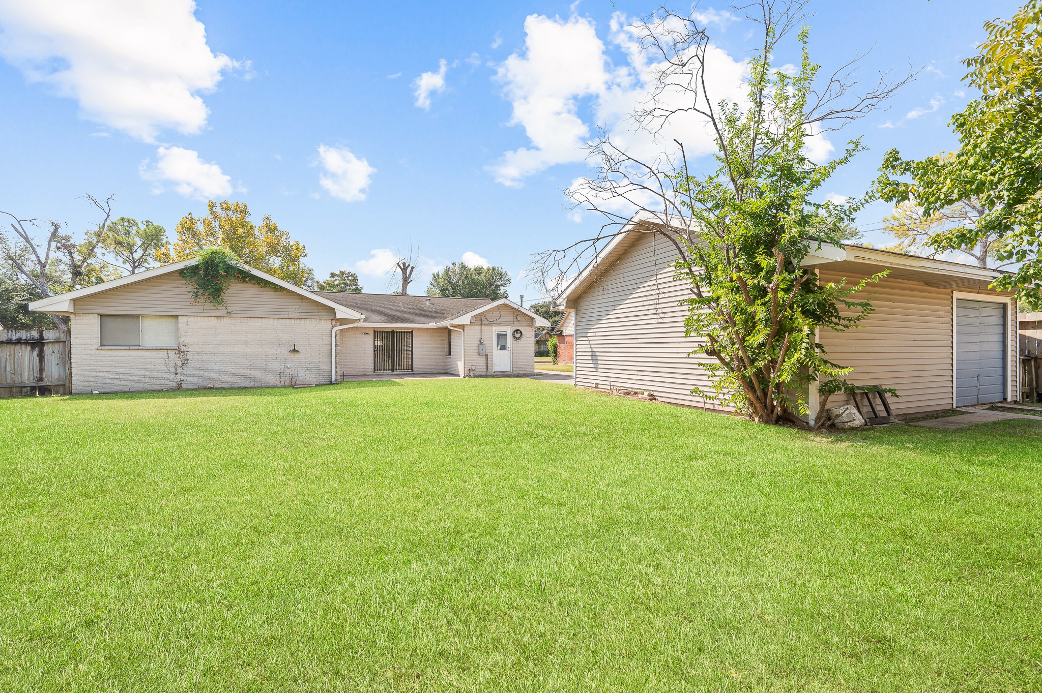 8314 Edgemoor Drive Houston, TX 77036 - Photo 34 of 34 a view of a house with backyard and garden