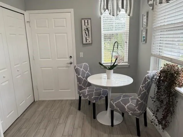 a view of a table and chairs in a room