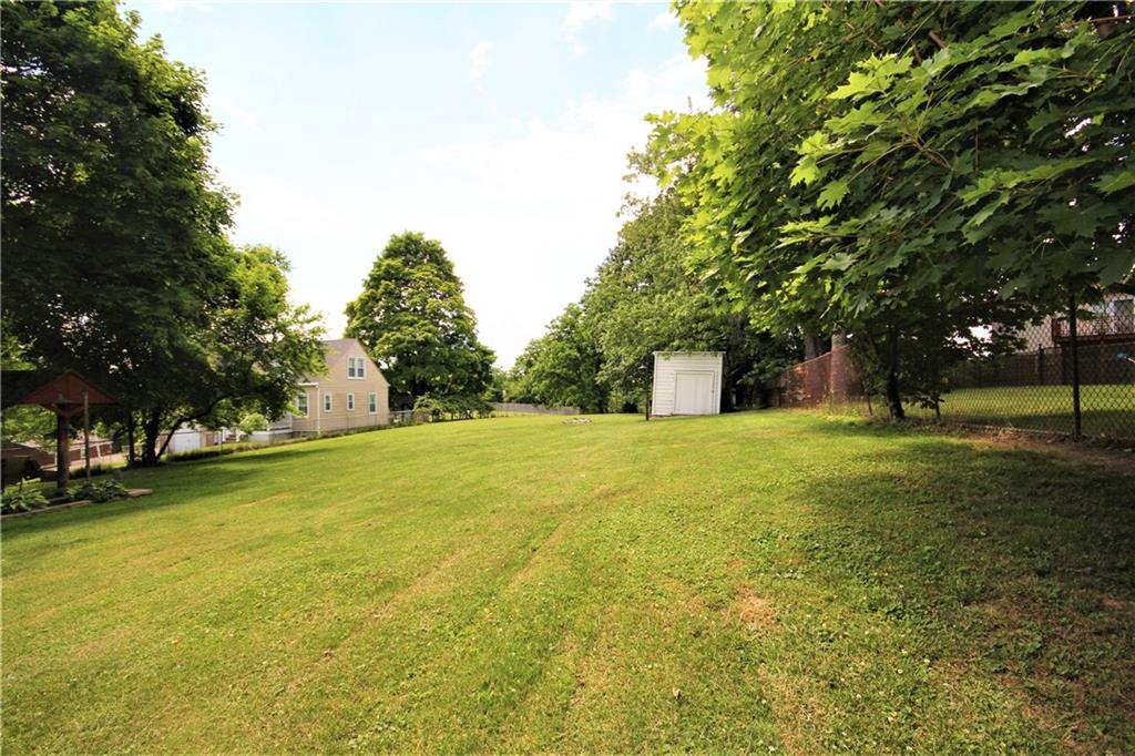 841 Hamil Road Verona, PA 15147 - Photo 17 of 23 Fenced in back yard features a shed and fire pit!