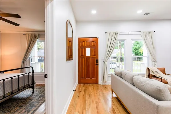a living room with furniture and a window