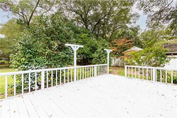a view of balcony with small garden