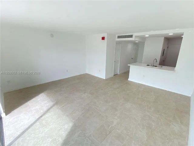 a bathroom with a shower and a toilet