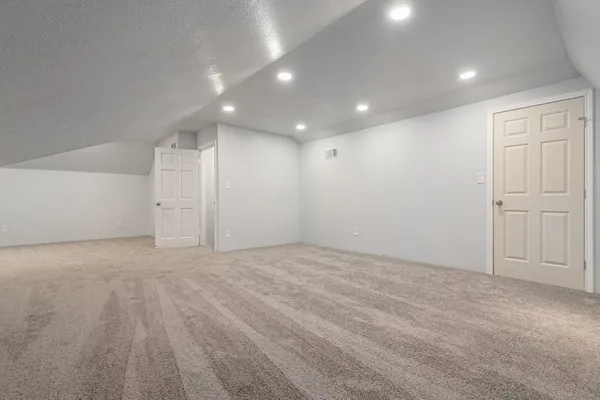 a front view of a house with a yard and porch