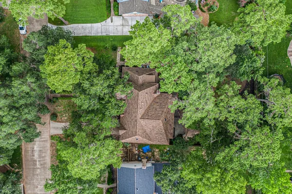a picture of a room with a white wall and mirror