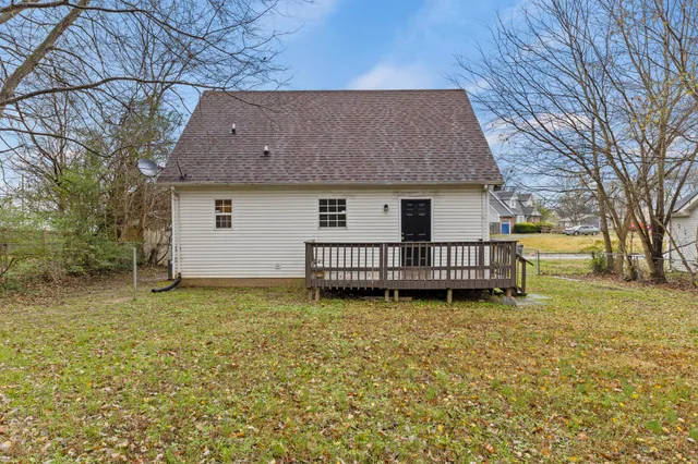 a house with trees in front of it