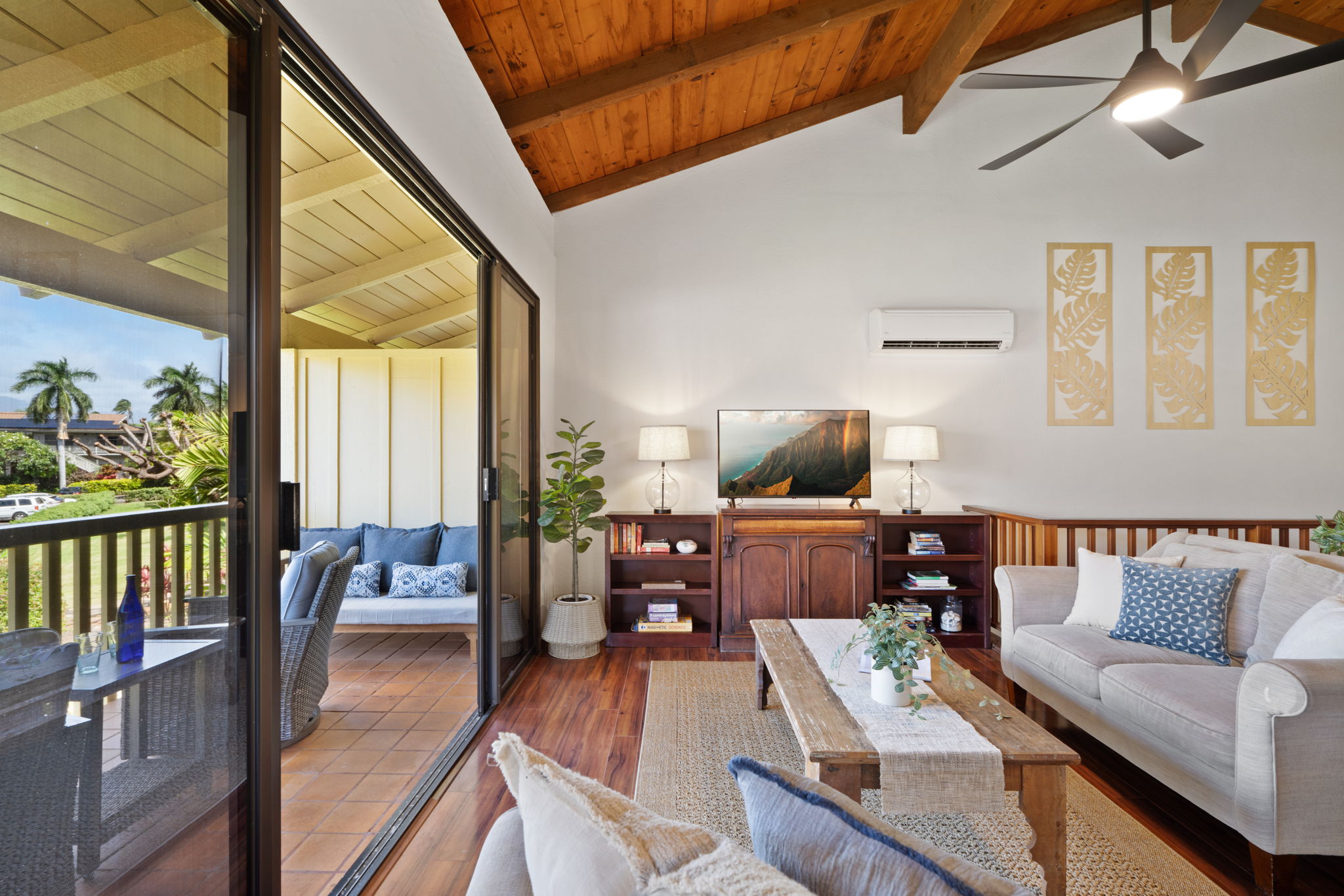 1870 Hoone Road, Unit 600 Koloa, HI 96756 - Photo 2 of 30 a living room with furniture and wooden floor