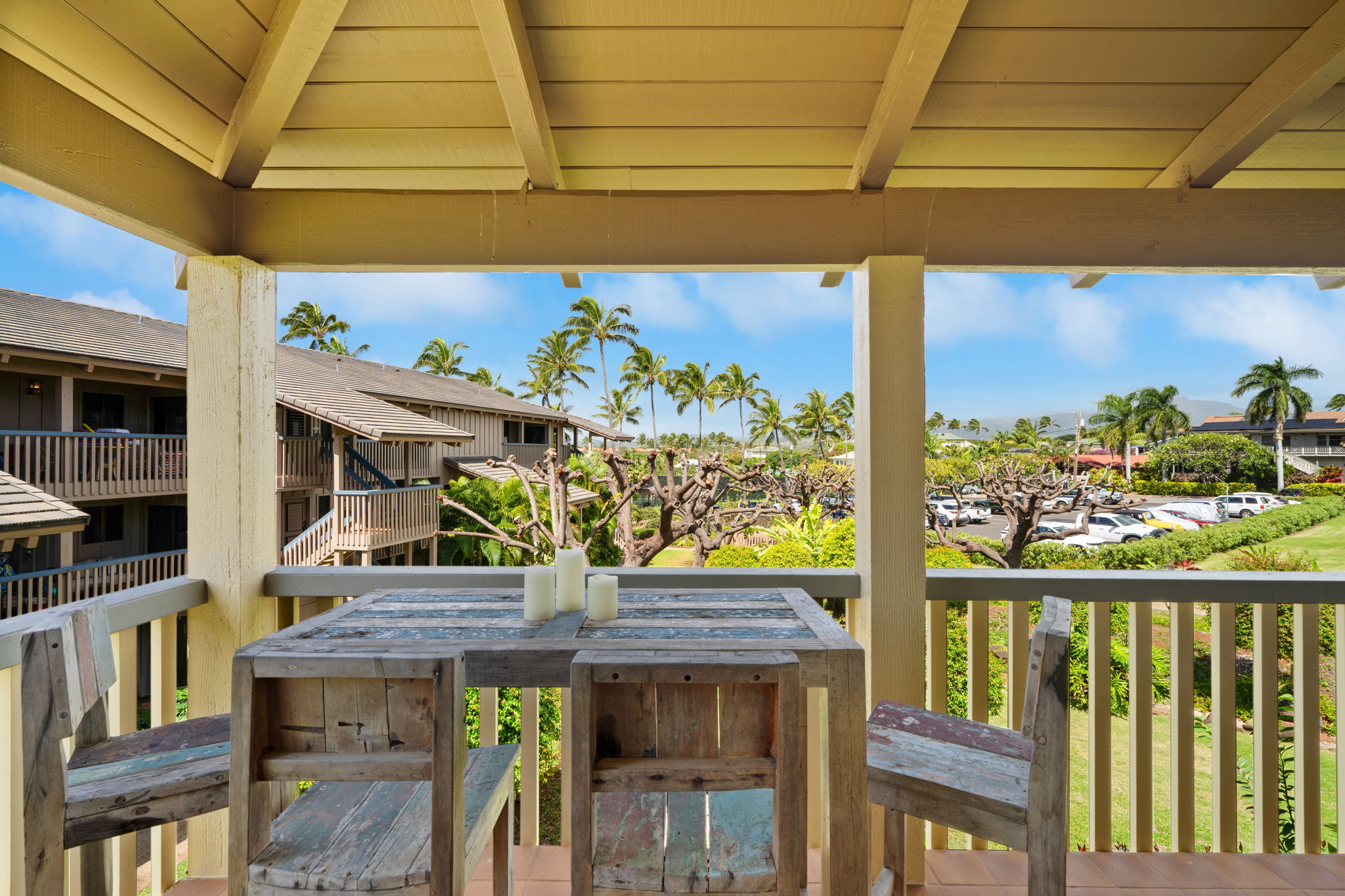 1870 Hoone Road, Unit 600 Koloa, HI 96756 - Photo 3 of 30 a view of a balcony with furniture and front view of a house