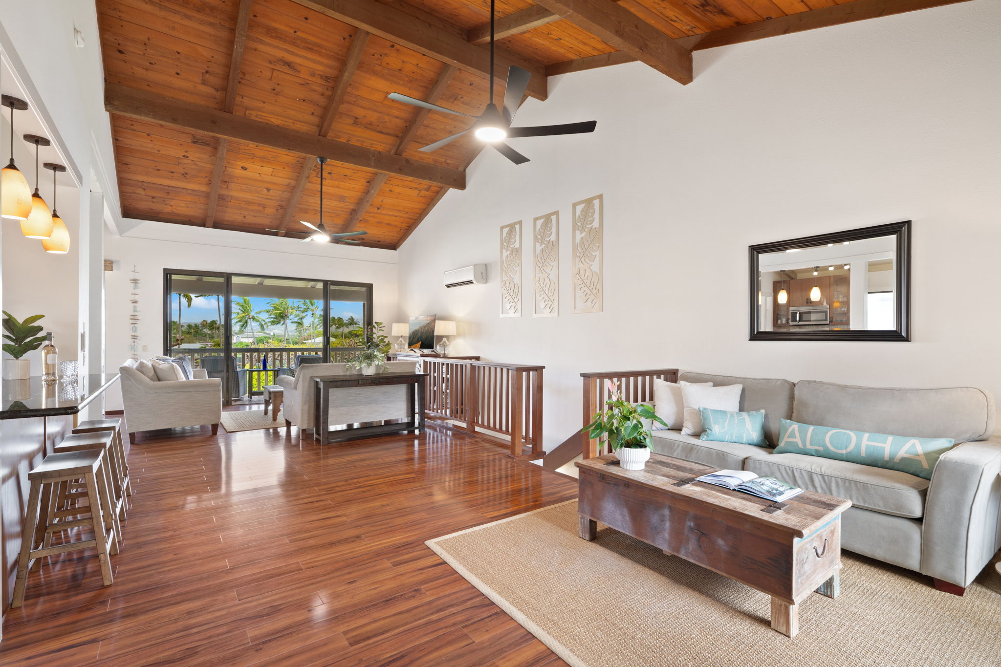 1870 Hoone Road, Unit 600 Koloa, HI 96756 - Photo 8 of 30 a living room with furniture and a large window