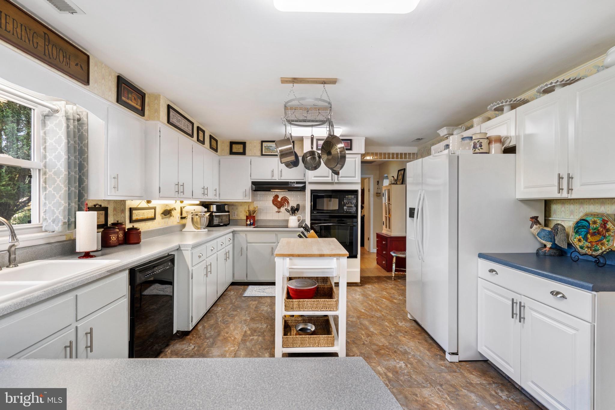 1355 Reunion Corner Road Gerrardstown, WV 25420 - Photo 10 of 28 Bright and inviting kitchen space.