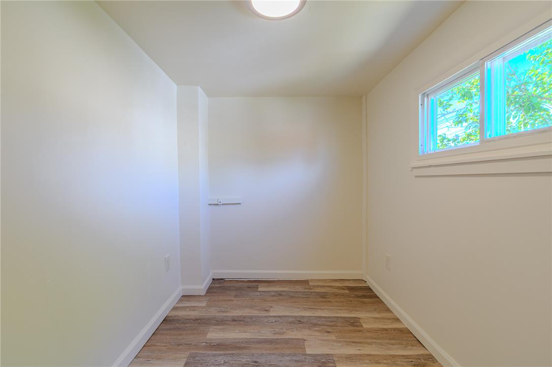 820 North 5th Street Allentown, PA 18102 - Photo 24 of 39 A compact interior room with resilient flooring offers a versatile space for various uses.