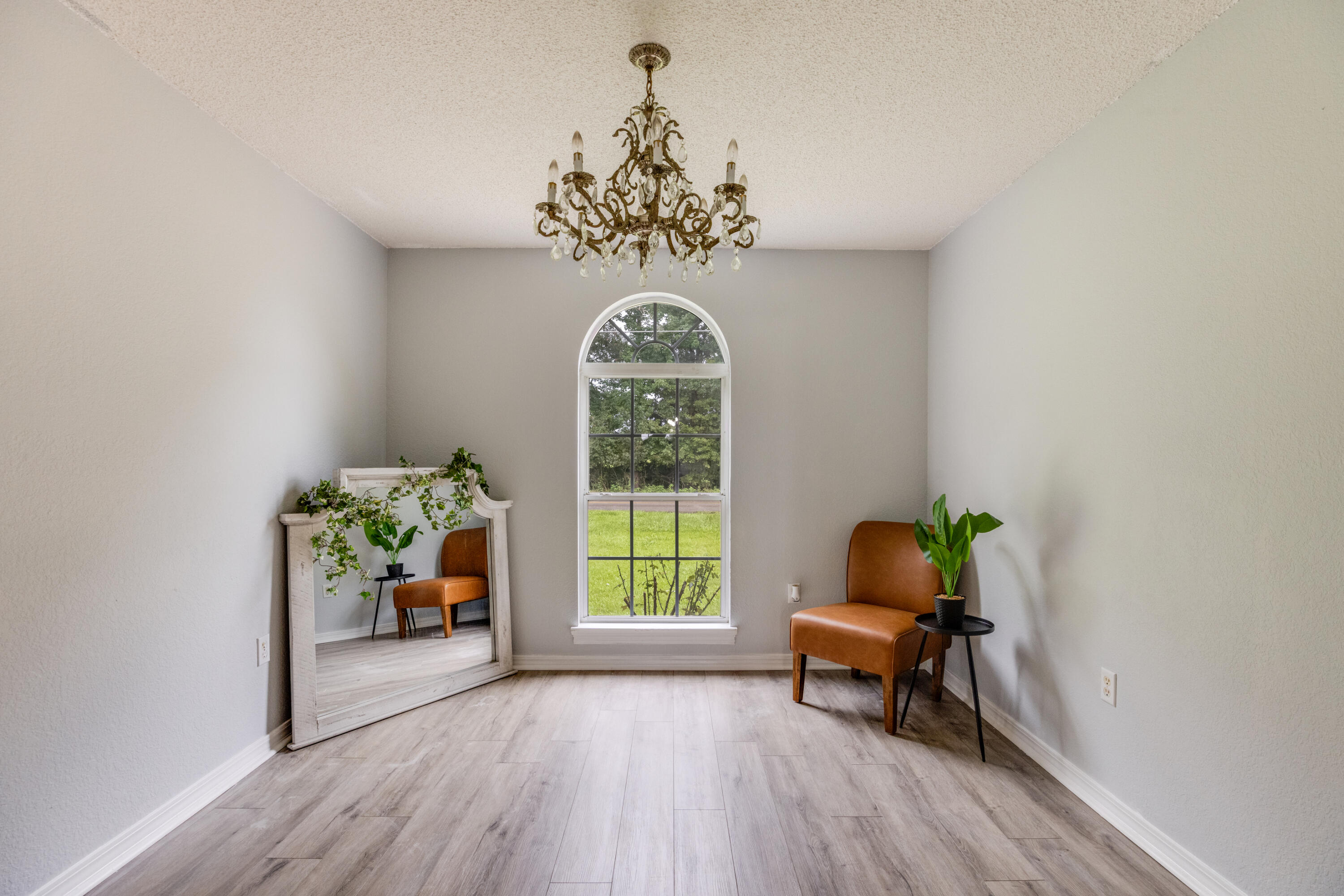 6090 Buckward Road Baker, FL 32531 - Photo 18 of 51 a living room with furniture and a window