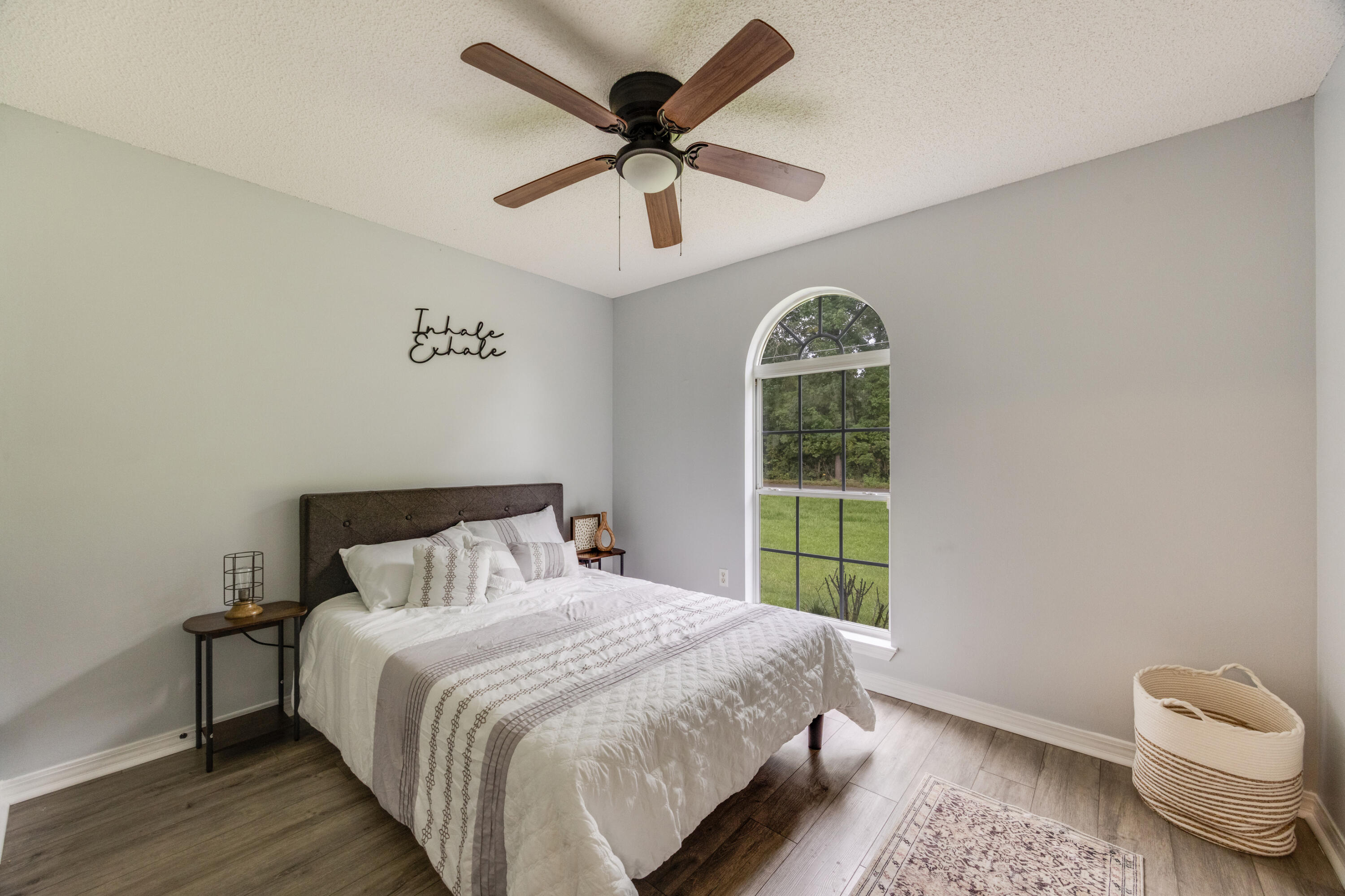 6090 Buckward Road Baker, FL 32531 - Photo 30 of 51 a bedroom with a bed and a window