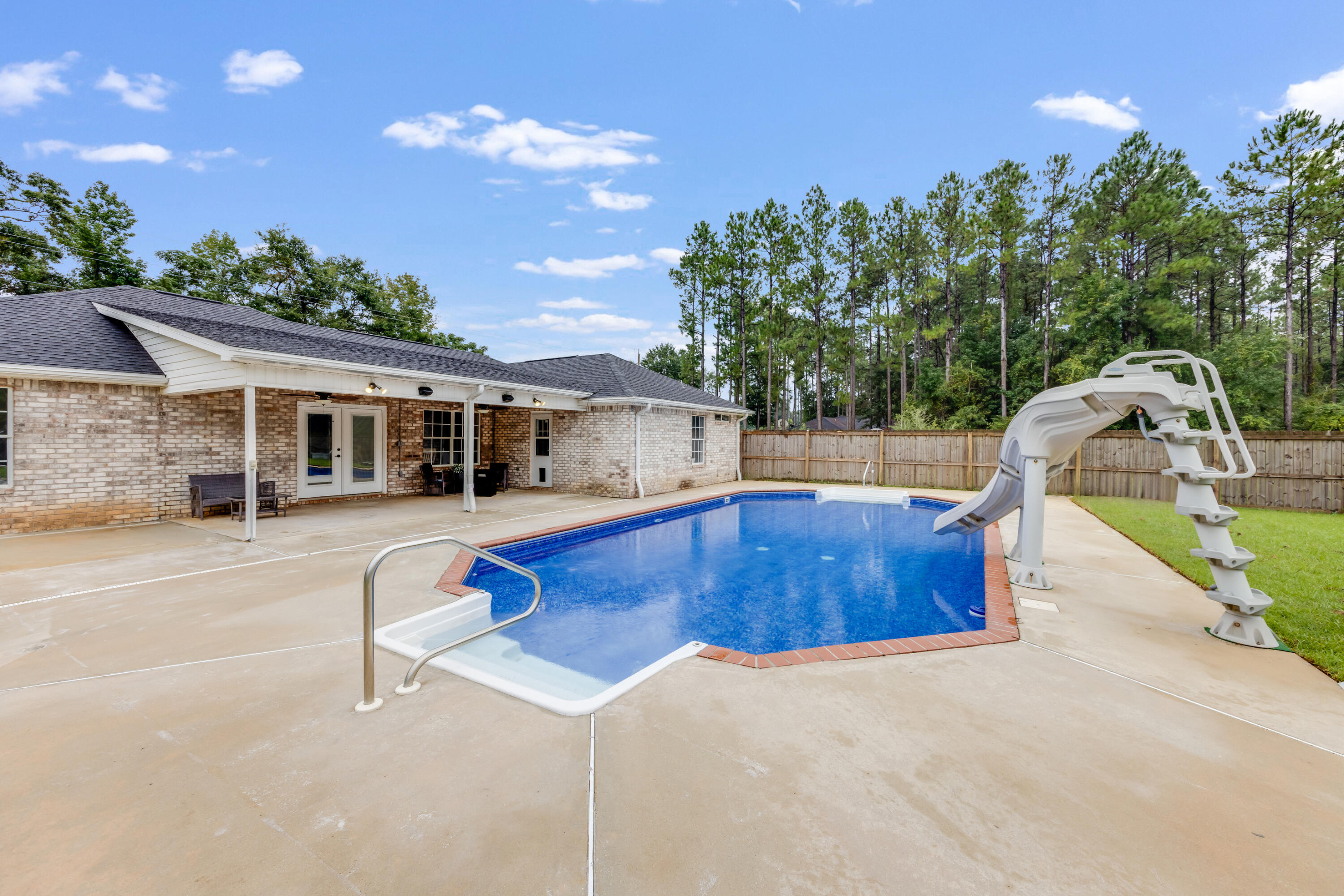 6090 Buckward Road Baker, FL 32531 - Photo 38 of 51 a house view with a sitting space and garden