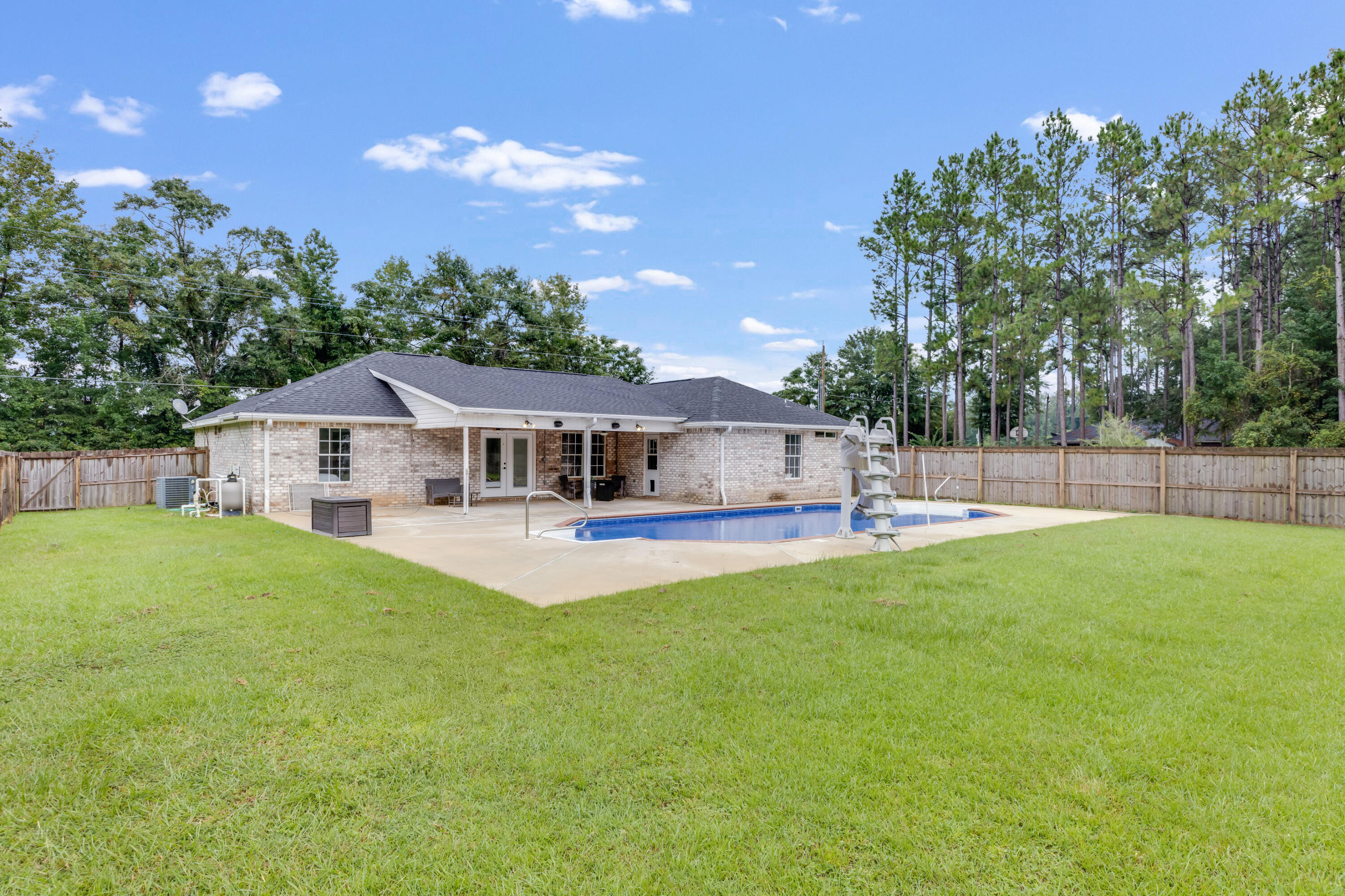 6090 Buckward Road Baker, FL 32531 - Photo 44 of 51 a house view with a garden space