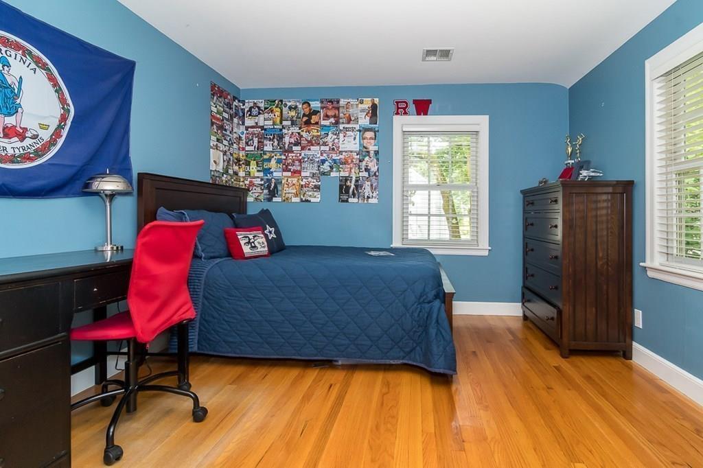 80 Mayo Road Wellesley, MA 02482 - Photo 11 of 22 a bedroom with a bed and window