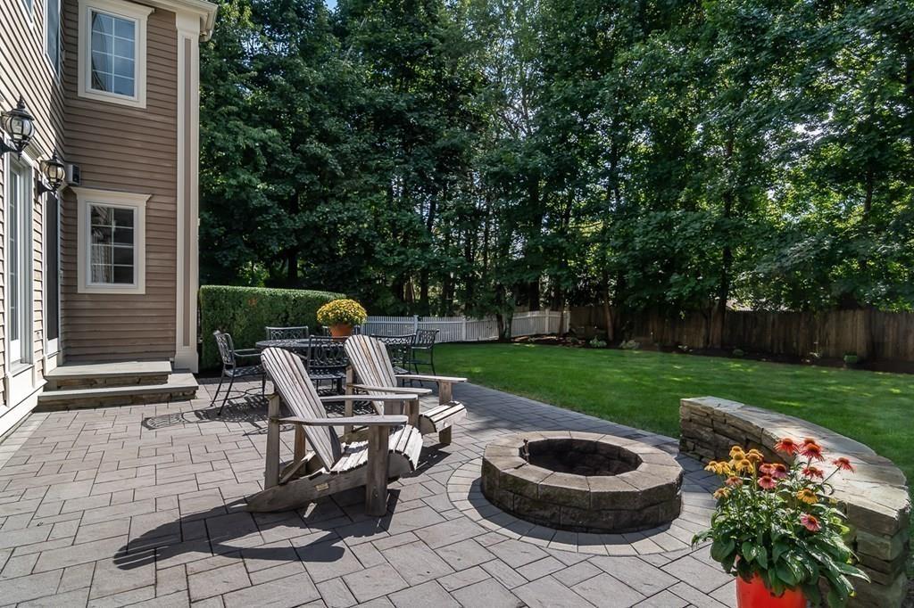 80 Mayo Road Wellesley, MA 02482 - Photo 20 of 22 a view of a chair and fire pit in the yard
