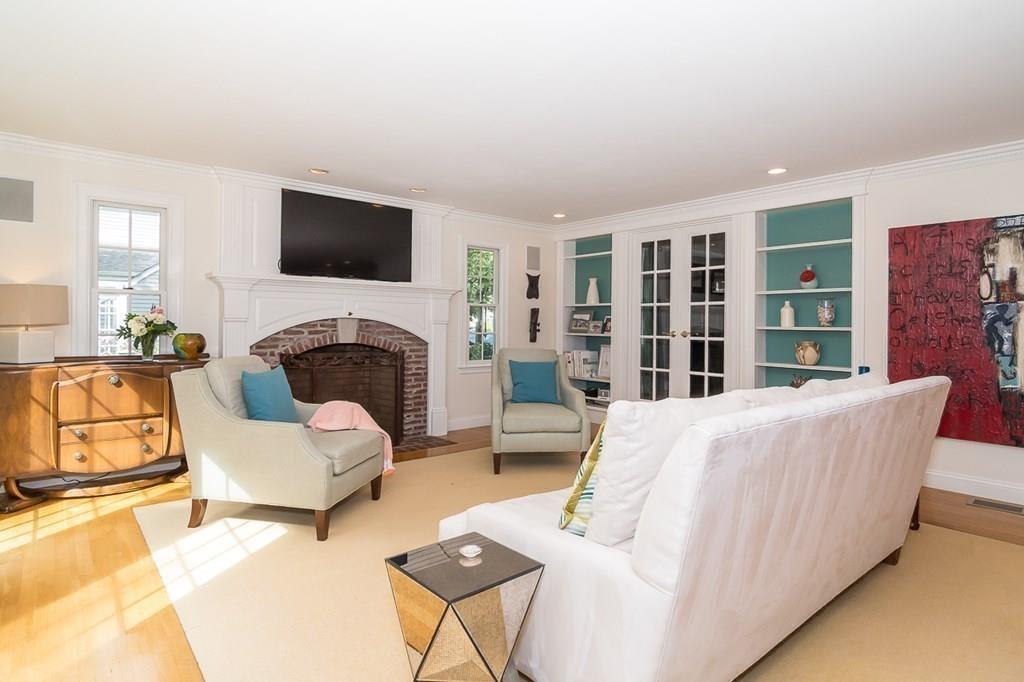 80 Mayo Road Wellesley, MA 02482 - Photo 6 of 22 a living room with furniture fireplace and a flat screen tv