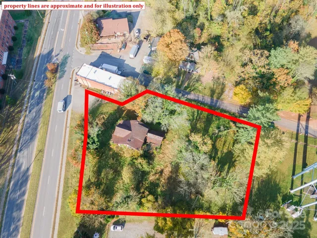 a view of swimming pool with large trees and outdoor seating
