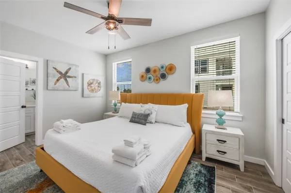 a kitchen with a refrigerator and cabinets