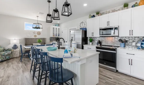 a view of kitchen and dining area