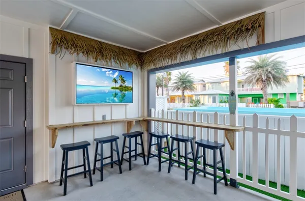 a view of a porch with furniture